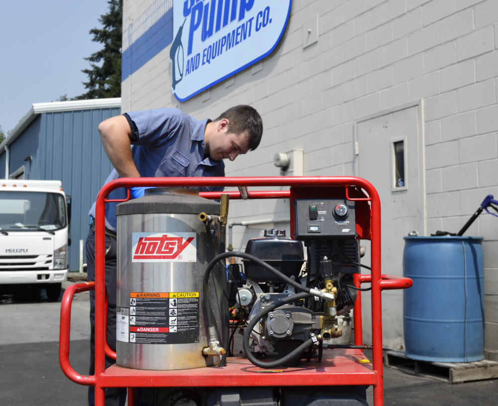 Bradley with Seattle Pump Repairing a Hotsy Hot Water Pressure Washer