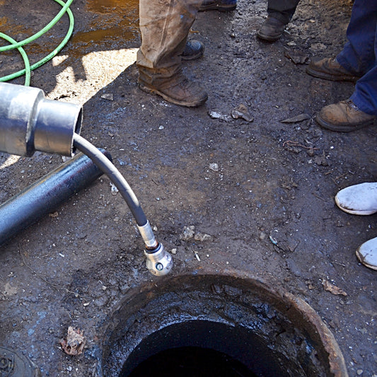 Jet Vac Warthog over a Manhole